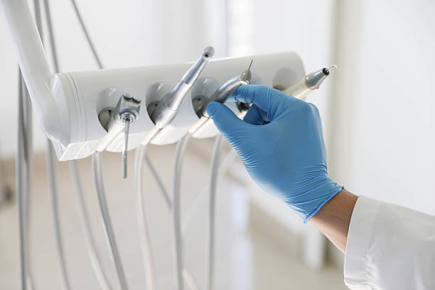 Professional Root Canal Treatment technician working in Town and Country, MO